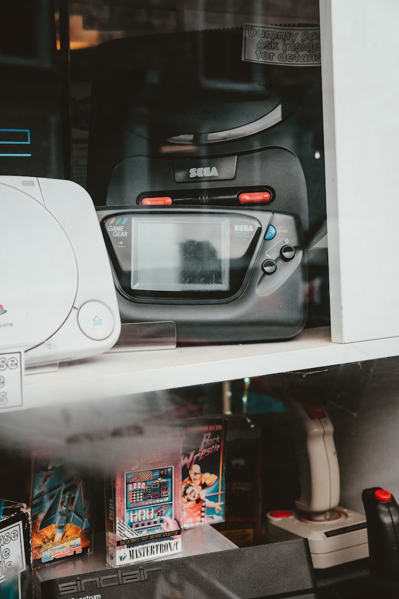 a close up of a nintendo game system on a shelf